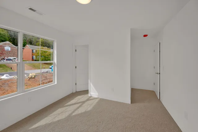 an empty room with windows