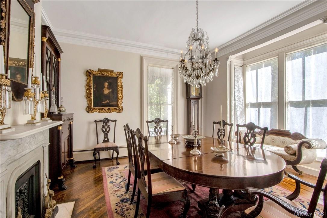 4 Deer Run Sparkill, NY 10976 - Photo 12 of 34 a view of a dining room with furniture and a chandelier