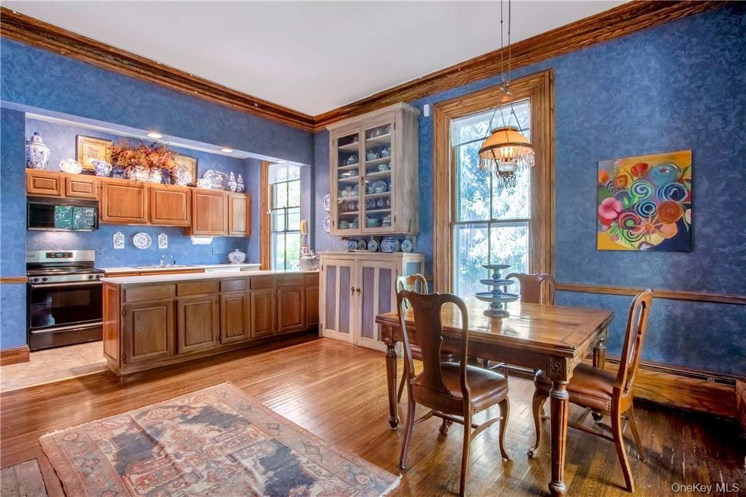 4 Deer Run Sparkill, NY 10976 - Photo 14 of 34 a view of a dining room with furniture and window