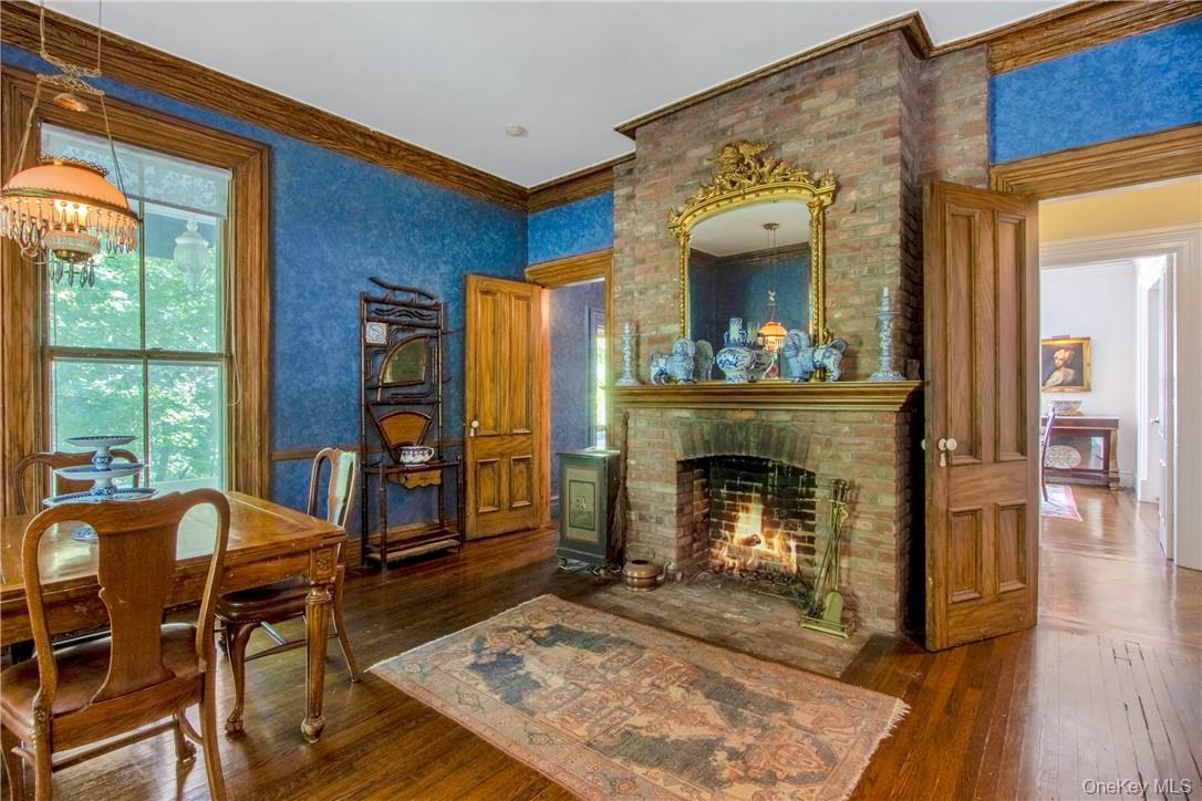 4 Deer Run Sparkill, NY 10976 - Photo 15 of 34 a living room with furniture and a fireplace