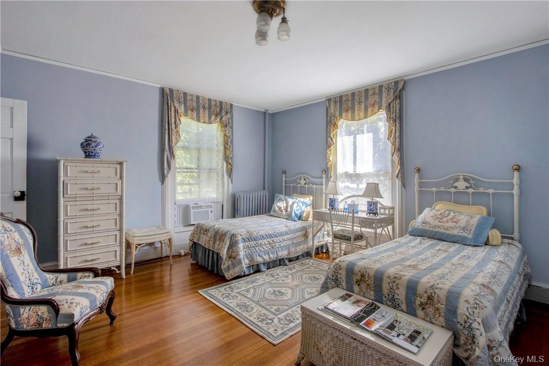 4 Deer Run Sparkill, NY 10976 - Photo 20 of 34 a bedroom with two beds and a chair