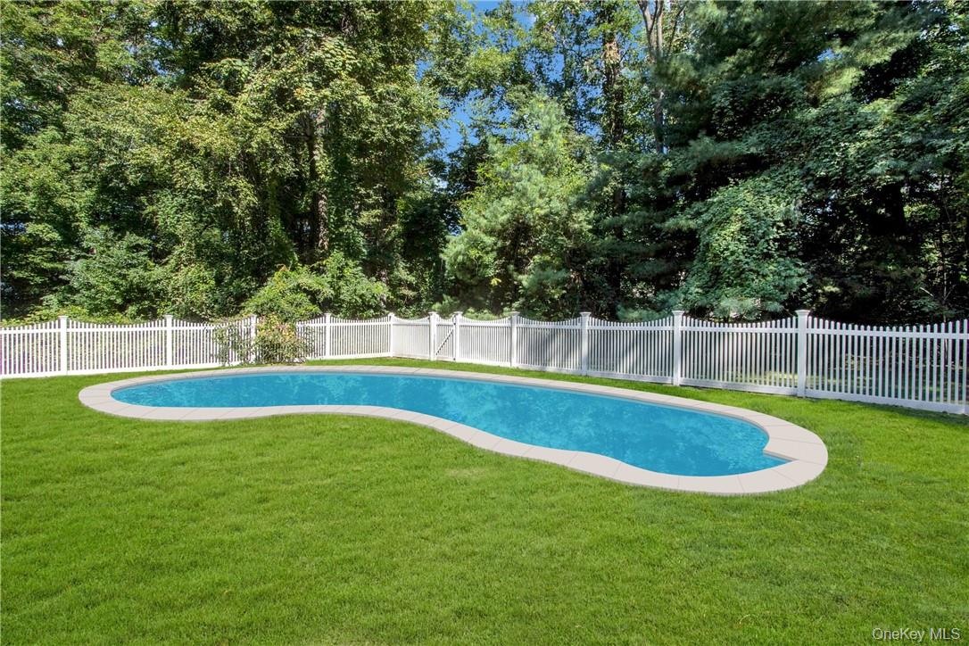4 Deer Run Sparkill, NY 10976 - Photo 24 of 34 a view of a swimming pool with a yard