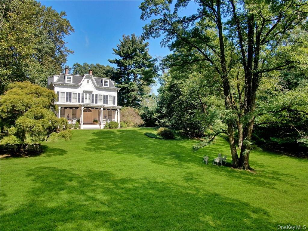 4 Deer Run Sparkill, NY 10976 - Photo 30 of 34 a front view of a house with a yard