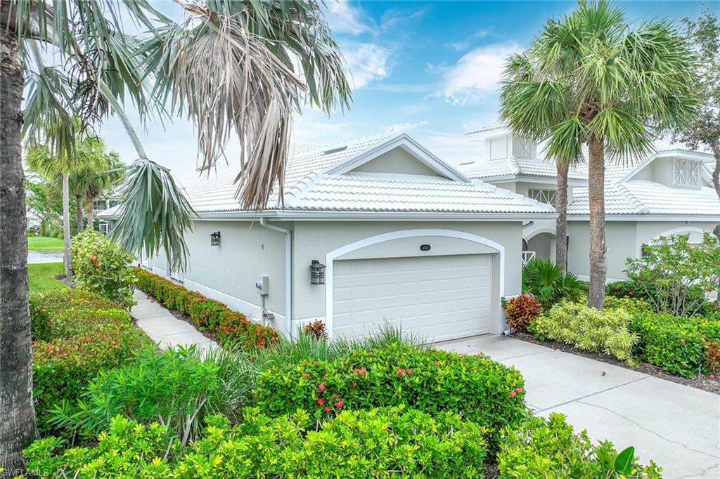 a front view of house with small garden