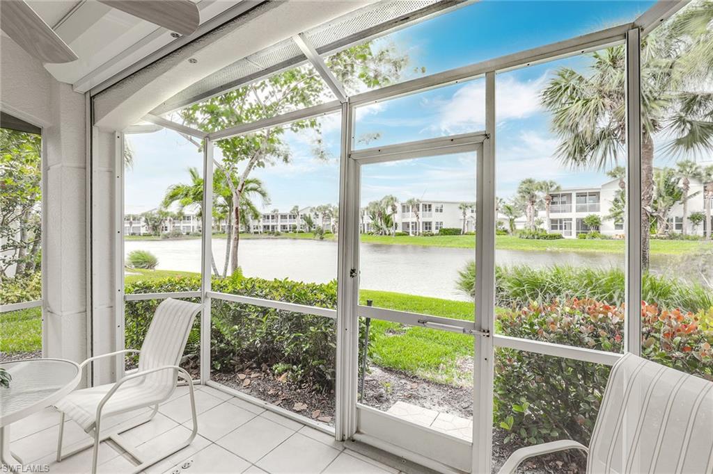 4541 Cardinal Cove Lane Naples, FL 34114 - Photo 17 of 42 a view of a city from a window