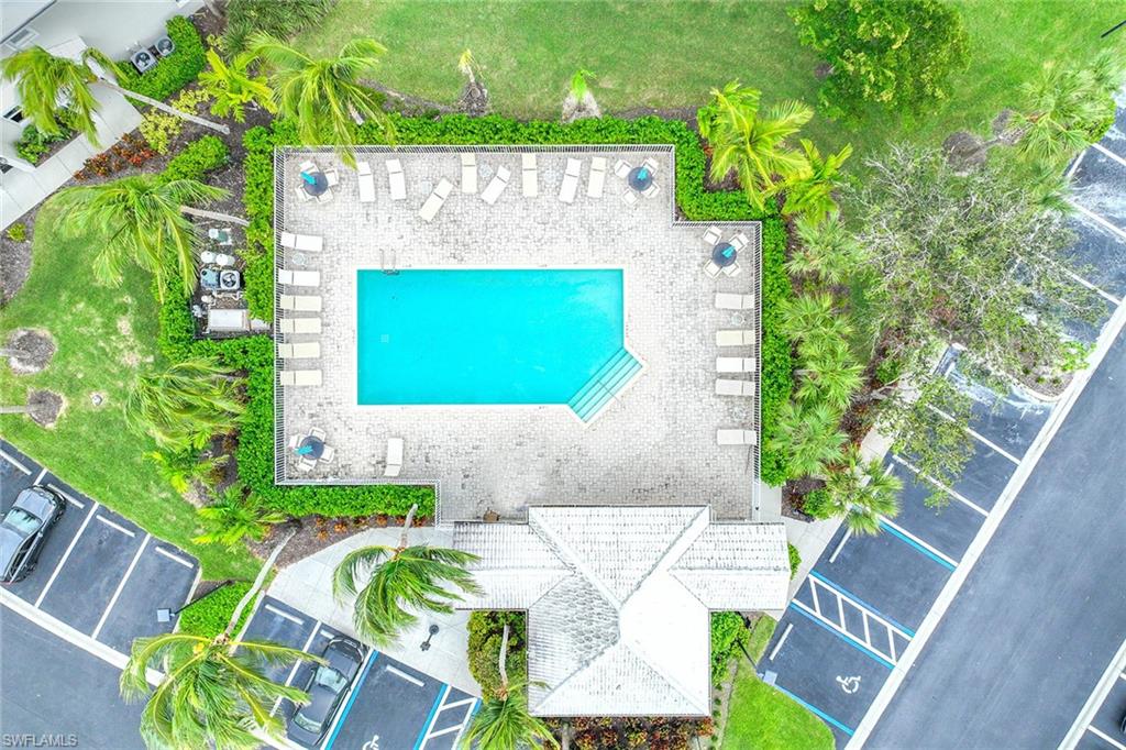 4541 Cardinal Cove Lane Naples, FL 34114 - Photo 29 of 42 a view of a yard with an outdoor seating