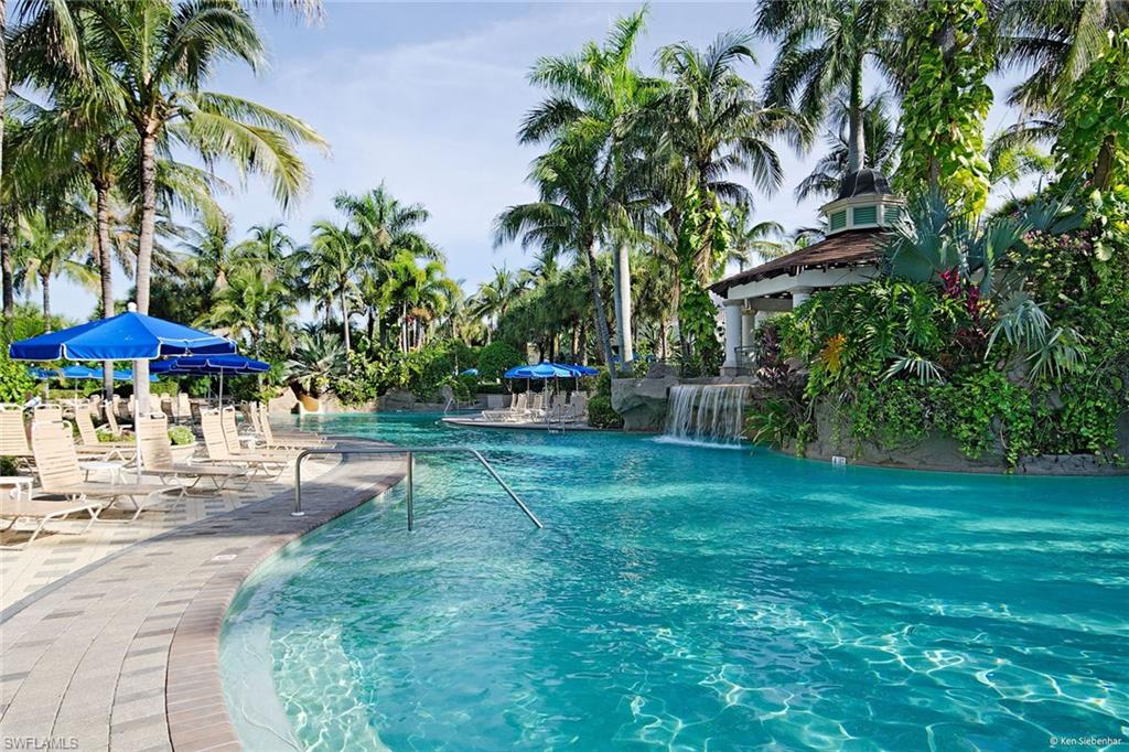4541 Cardinal Cove Lane Naples, FL 34114 - Photo 37 of 42 a view of a backyard with a patio