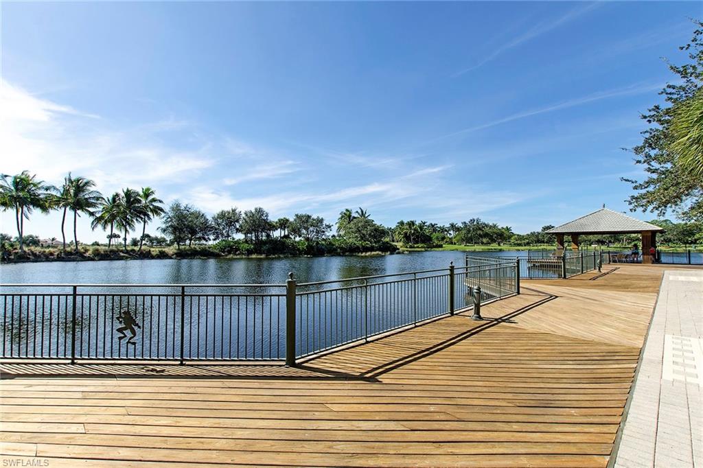 4541 Cardinal Cove Lane Naples, FL 34114 - Photo 39 of 42 a view of a lake from a roof deck
