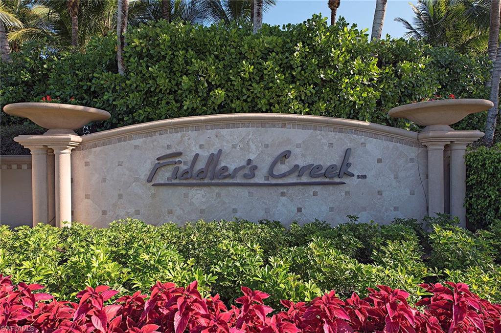 4541 Cardinal Cove Lane Naples, FL 34114 - Photo 42 of 42 a view of a bunch of flowers