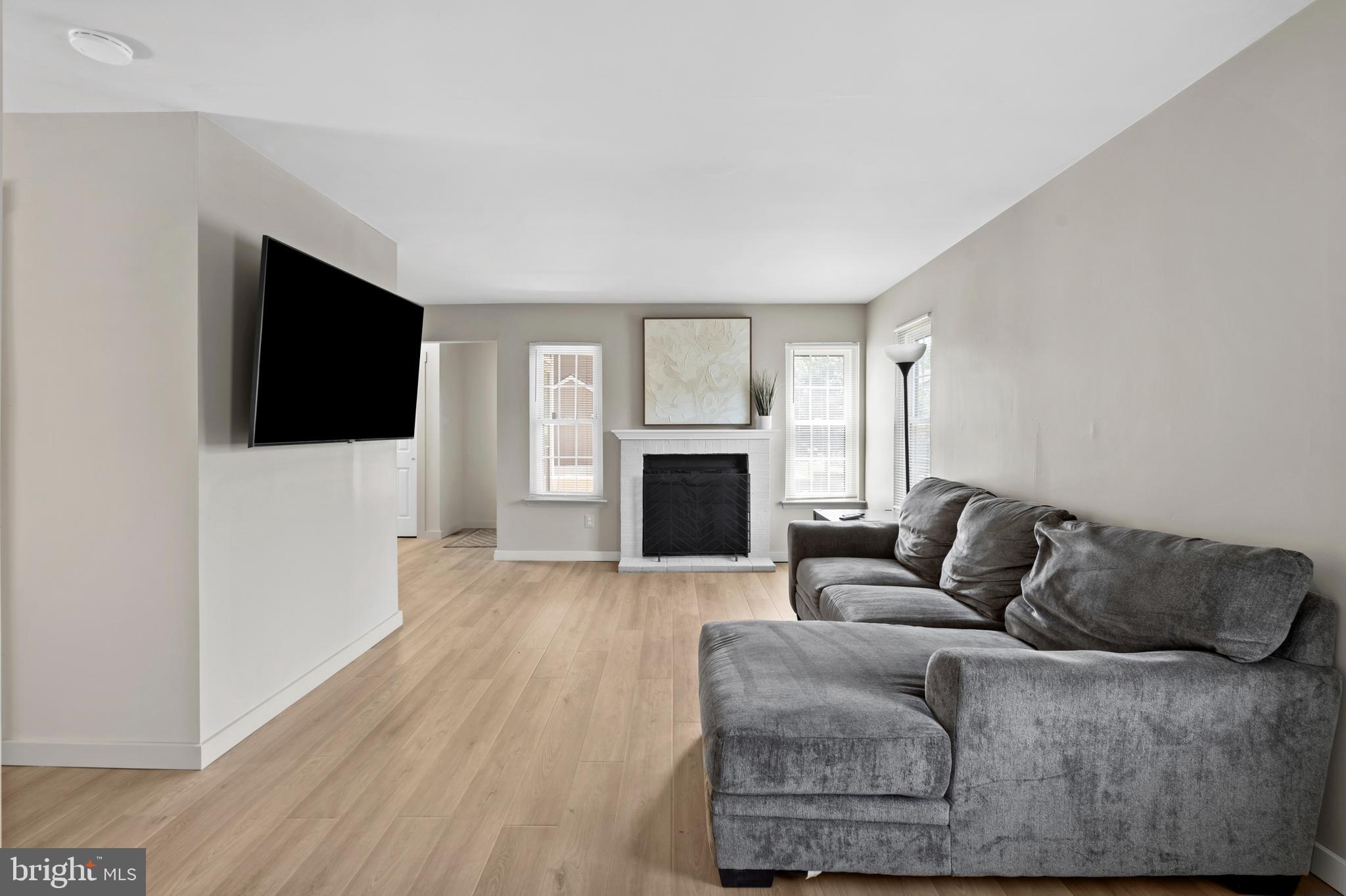 110 Rutledge Court North Wales, PA 19454 - Photo 7 of 35 a living room with furniture and a flat screen tv