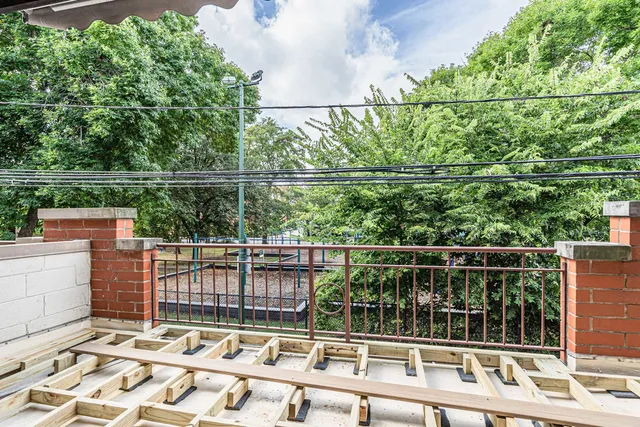a balcony with a bench