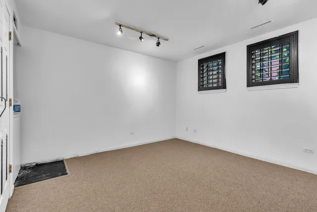 an empty room with windows