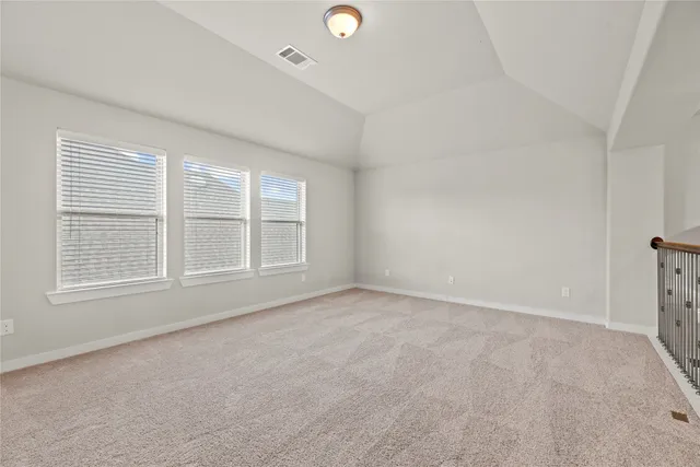 a bathroom with a granite countertop sink toilet a large mirror and shower