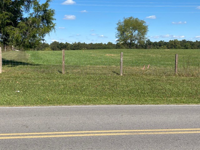 0 Hogan Road Burns, TN 37029 - Photo 6 of 22 a view of a green yard with a lake view