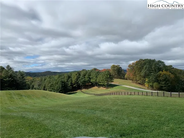 a view of a golf course with a garden