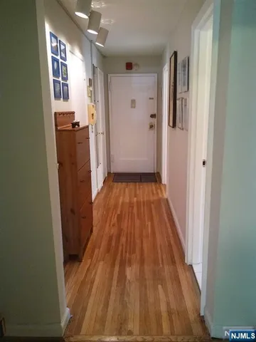 a dining room with a table and chairs