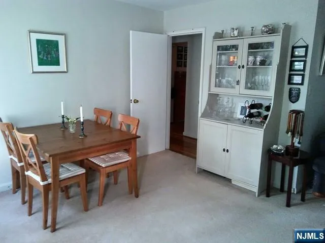 a kitchen with stainless steel appliances a sink and cabinets