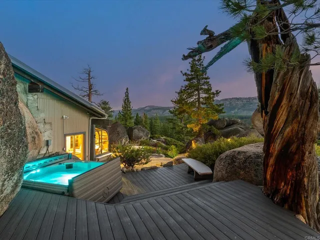 a view of a couches on the roof deck