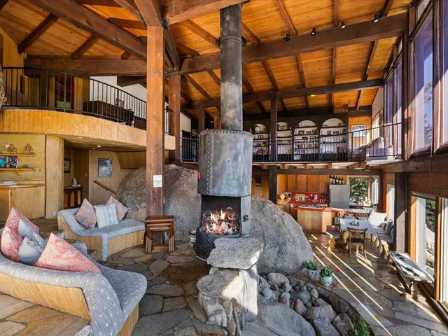 a view of a chairs and tables in the balcony