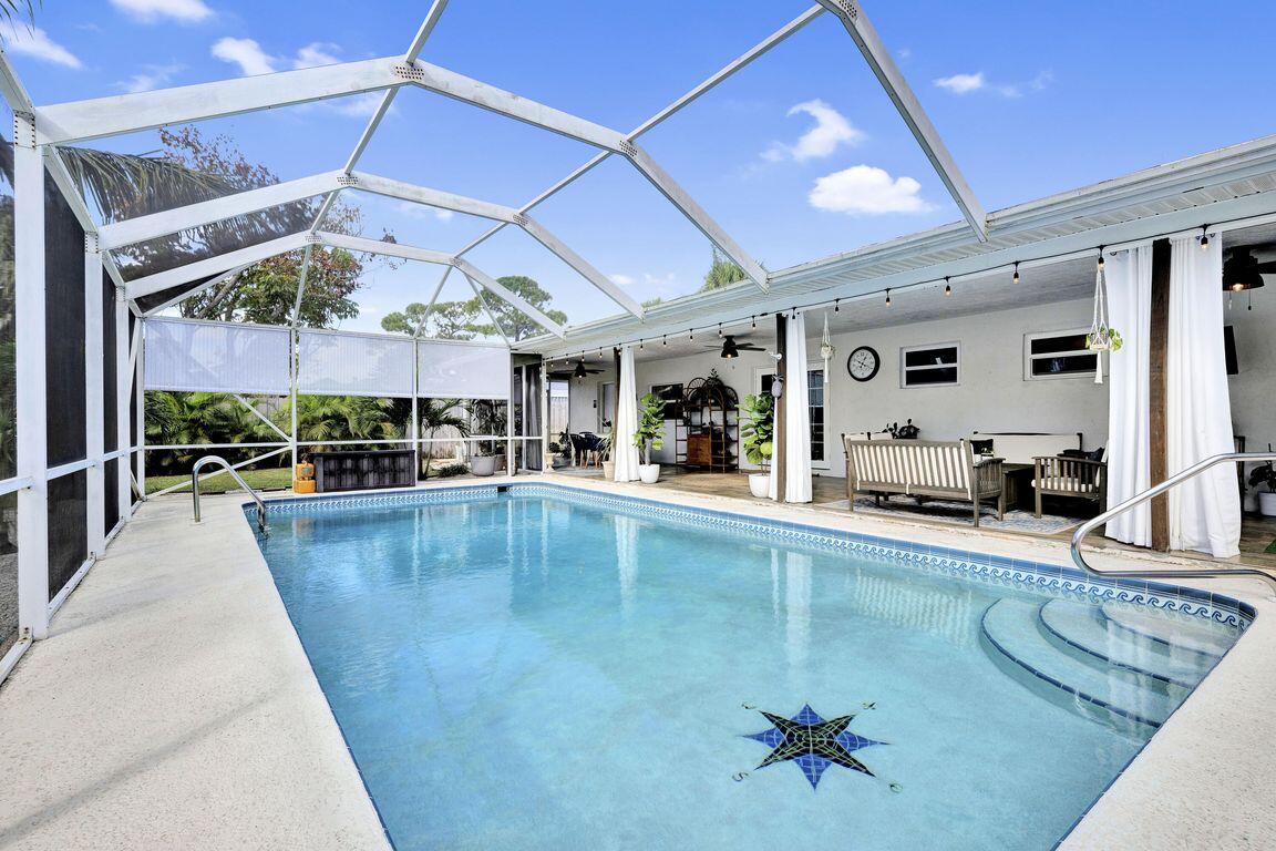 1104 Northwest 12th Terrace Stuart, FL 34994 - Photo 23 of 32 Rear w Pool