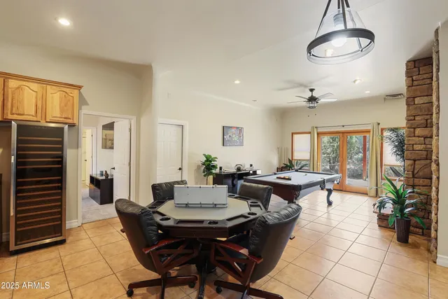 a view of a dining room with furniture window and outside view