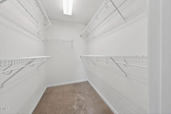 a view of a room with racks on the wall