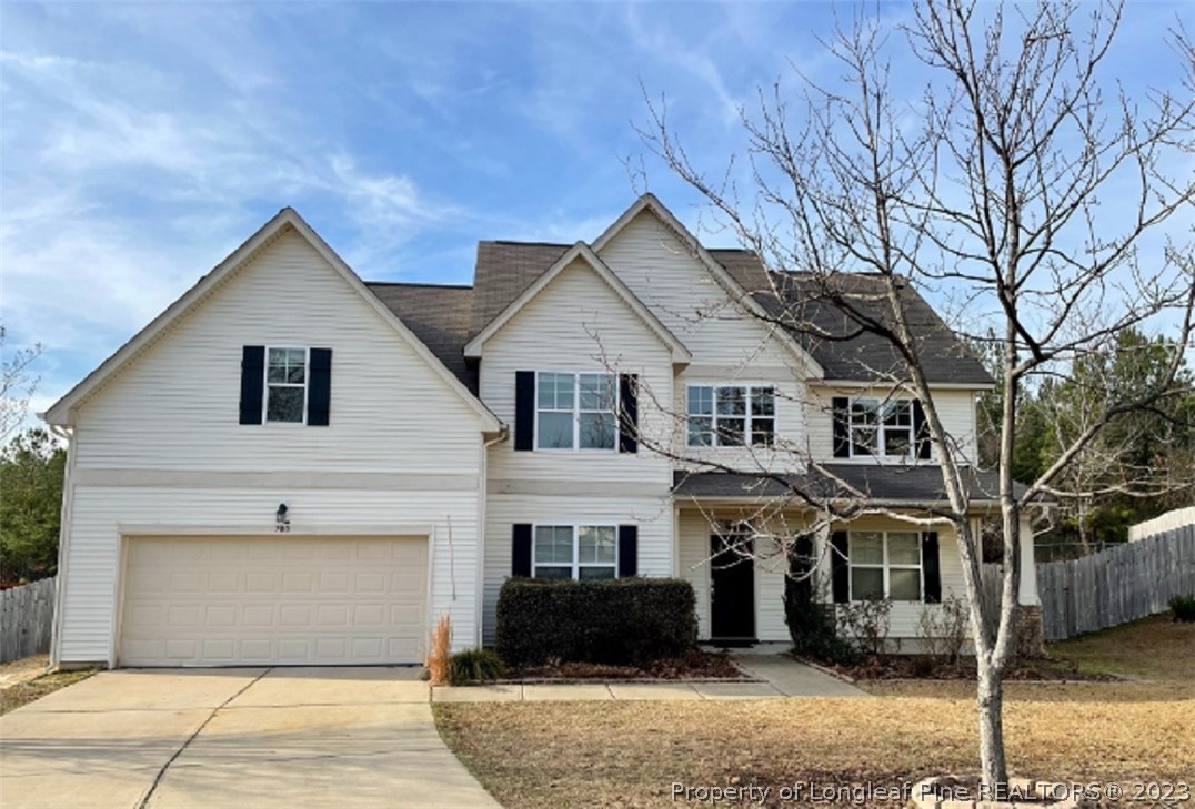 700 Heathrow Drive Spring Lake, NC 28390 - Photo 1 of 11 a view of a white house with large windows