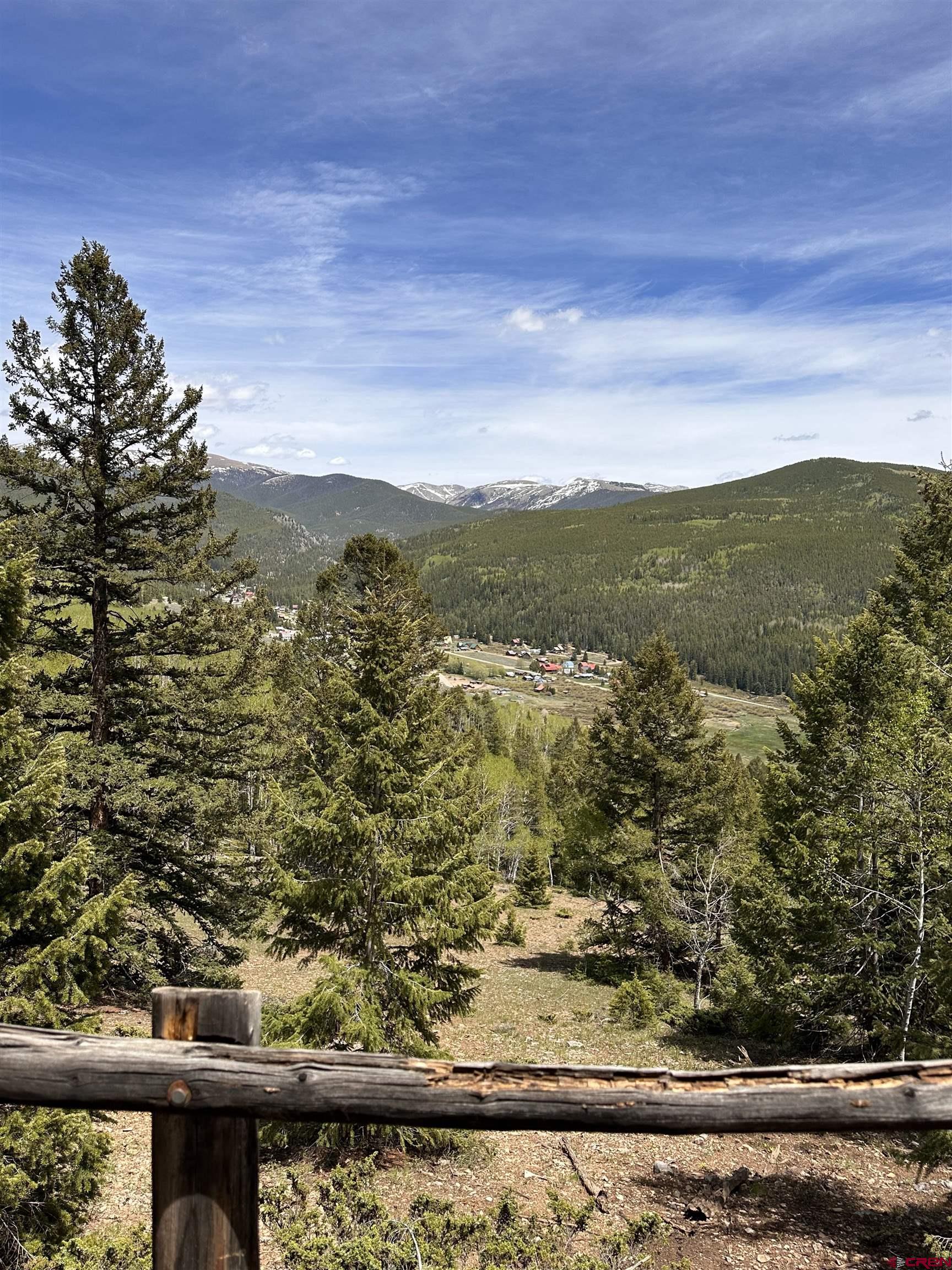 435 Soul's Ease Road Pitkin, CO 81241 - Photo 11 of 35 View from Deck - overlooking the Town of Pitkin and Colorado peaks! Happy hour anyone?