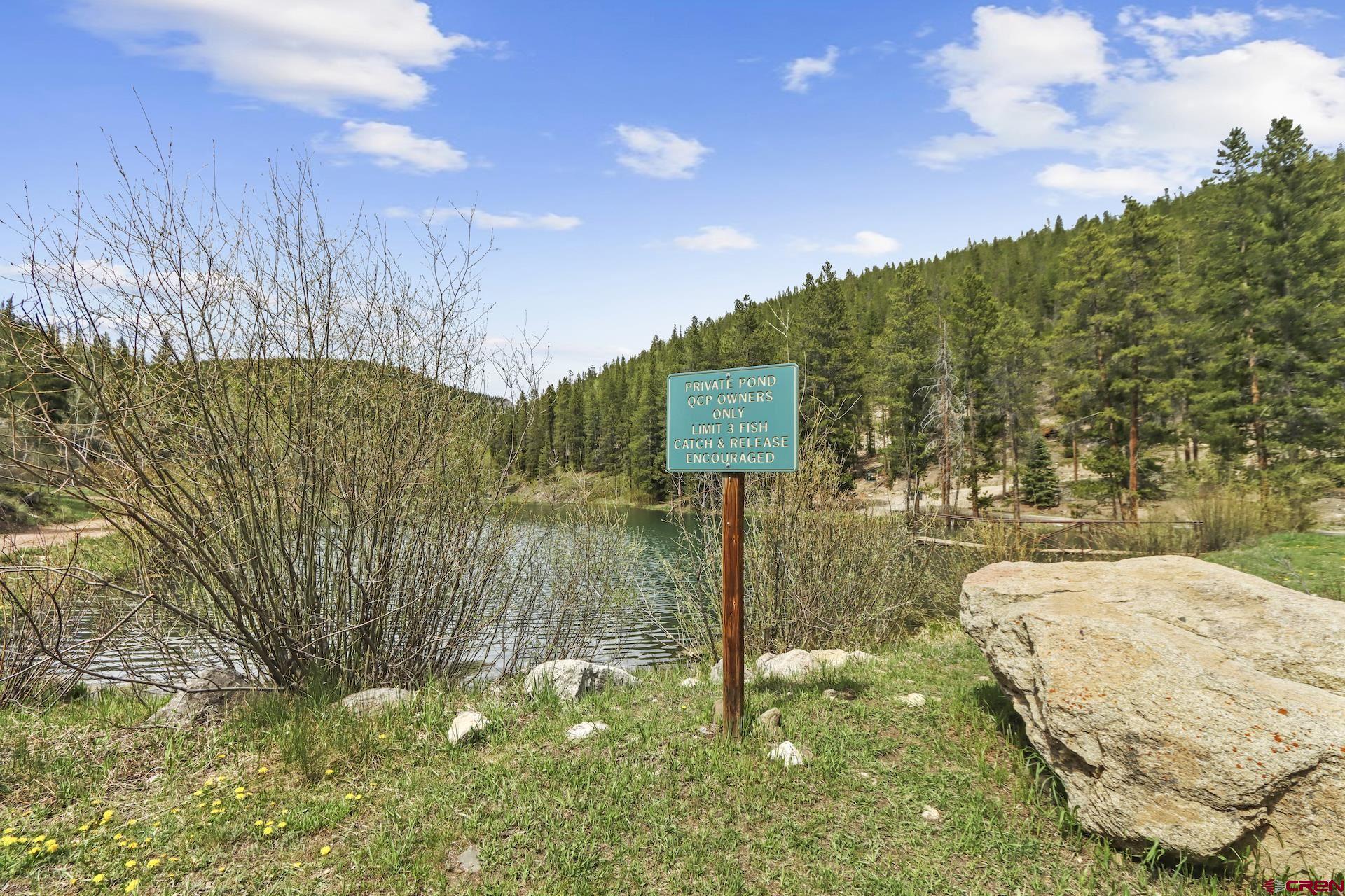 435 Soul's Ease Road Pitkin, CO 81241 - Photo 24 of 35 Stocked fishing pond for QCPOA property owners. Just a 5 minute drive away!
