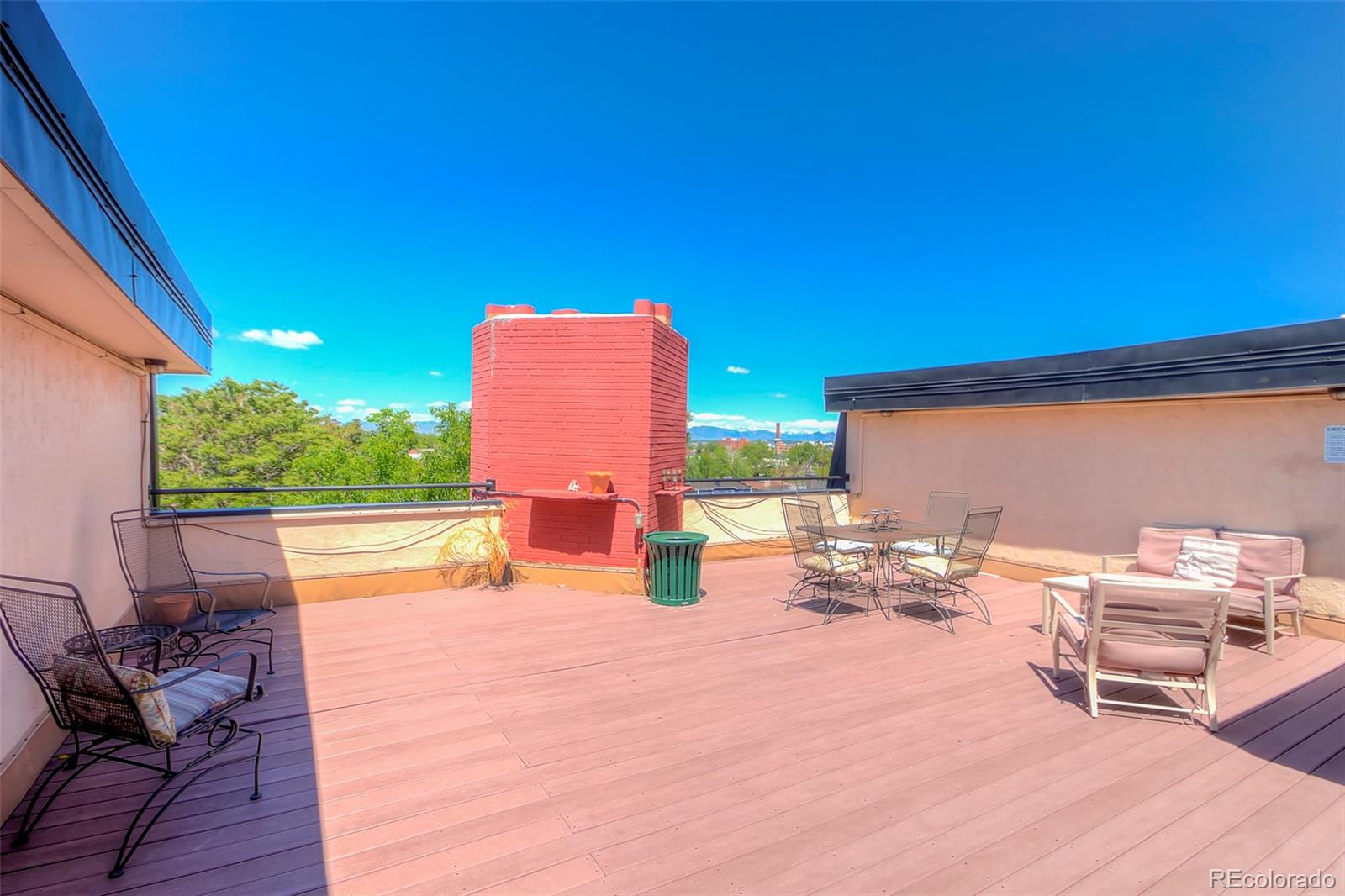 336 Grant Street, Unit 102 Denver, CO 80203 - Photo 13 of 22 a swimming pool with outdoor seating