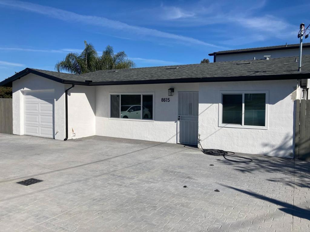 8615 Placid View Drive, Unit A Santee, CA 92071 - Photo 1 of 36 a view of a white house with a large window