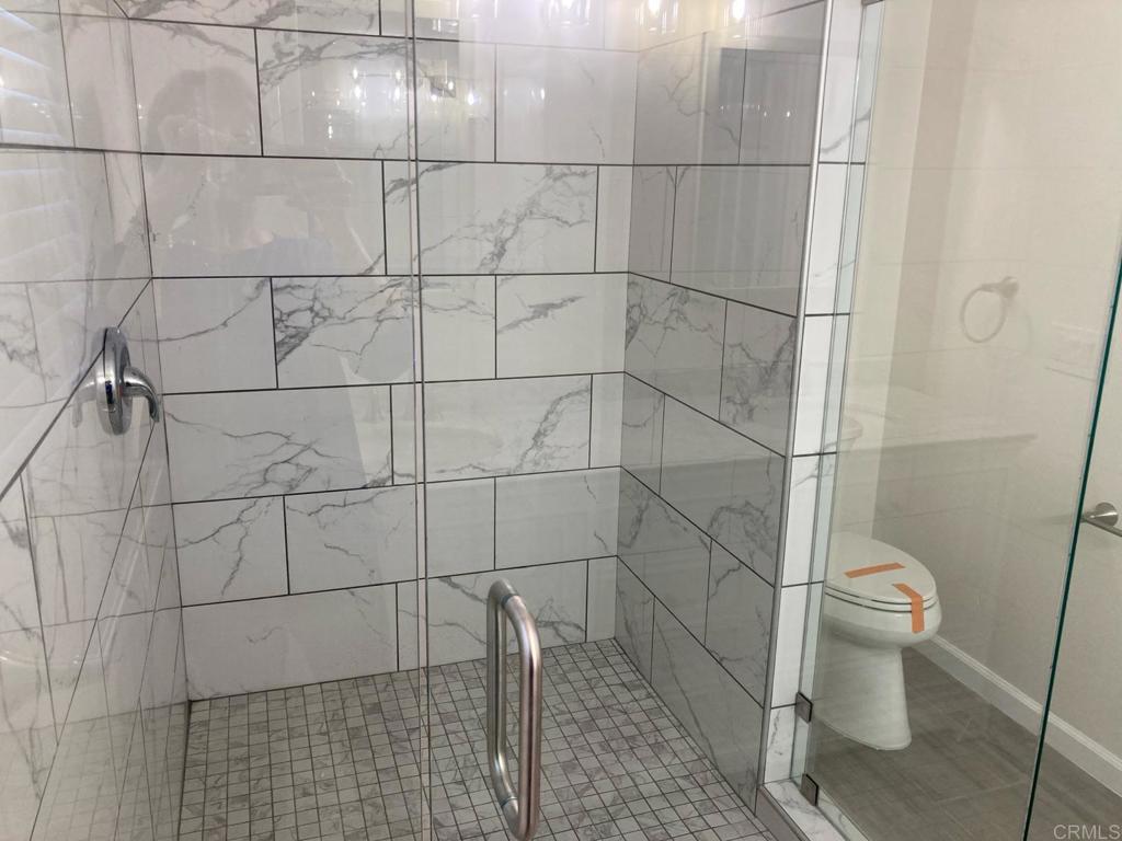 8615 Placid View Drive, Unit A Santee, CA 92071 - Photo 17 of 36 a bathroom with a sink and toilet