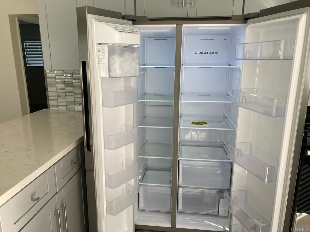 8615 Placid View Drive, Unit A Santee, CA 92071 - Photo 6 of 36 a walk in closet with wooden floor