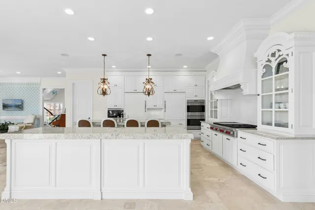 a view of a balcony with chair and wooden floor