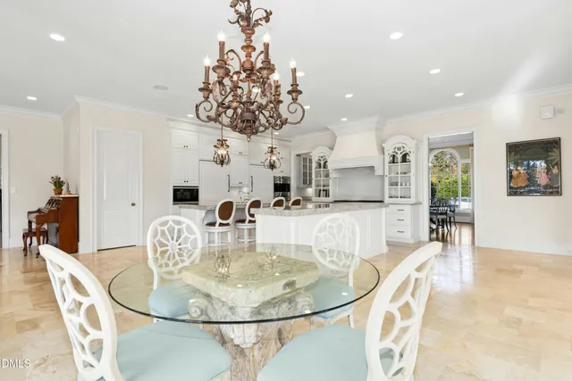 a view of swimming pool with an outdoor space and seating area