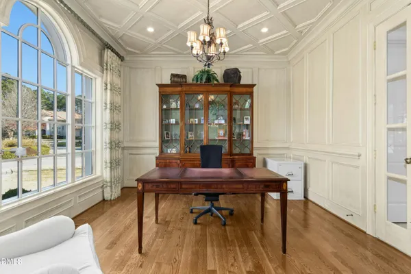 a bathroom with a shower curtain and a sink