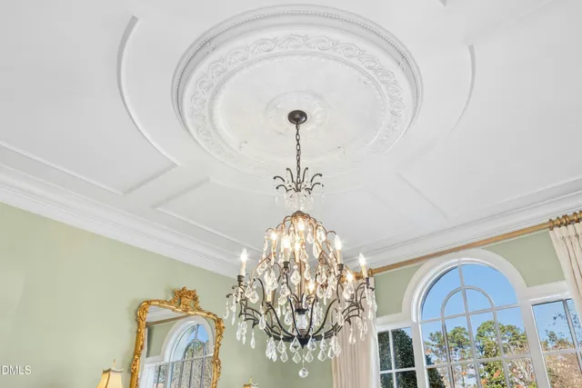 a spacious bathroom with double vanity a sink a large mirror a shower and vanity