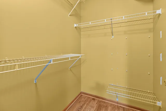 a view of a room with racks on the wall