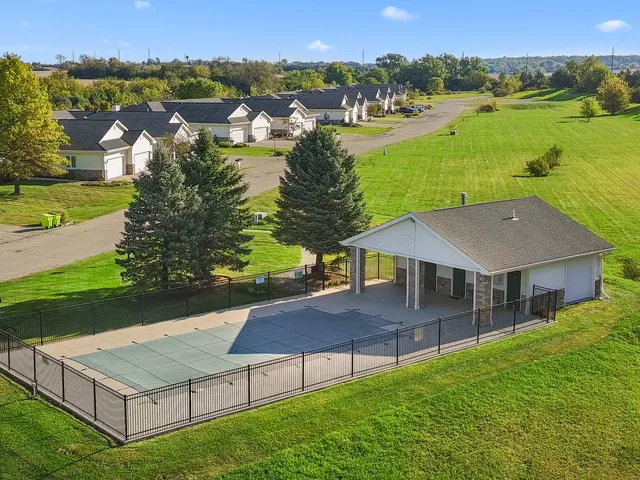 an aerial view of a house with big yard