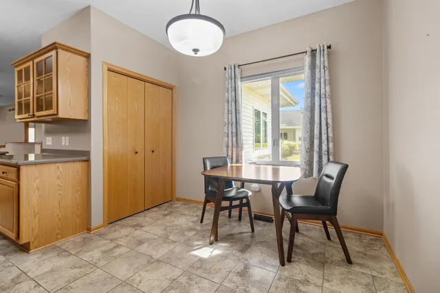 a view of a dining room with furniture