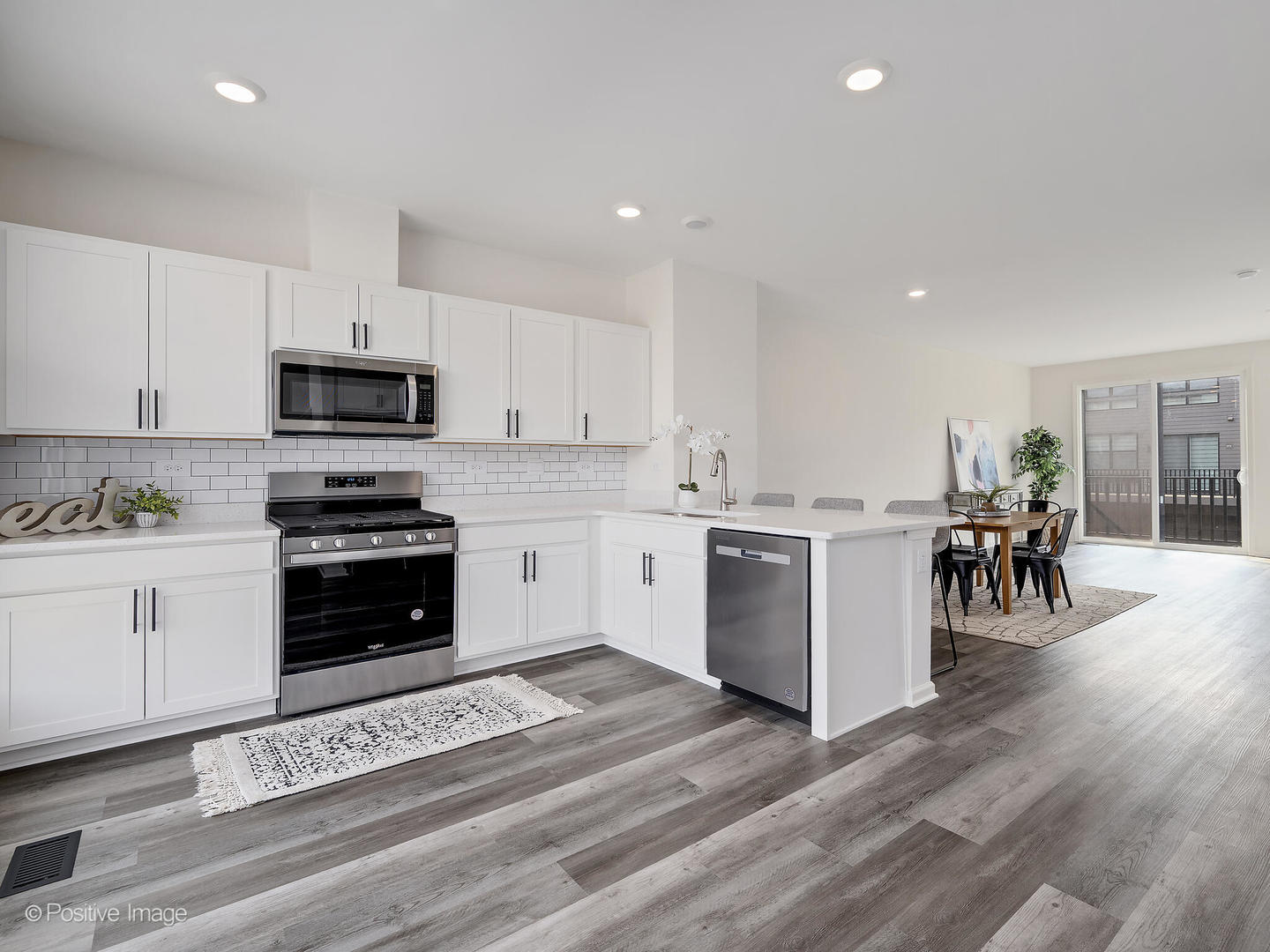 317 Summit Circle Lombard, IL 60148 - Photo 11 of 29 a kitchen with a refrigerator and a stove top oven