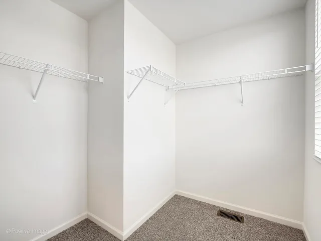 a view of small space with racks on the wall