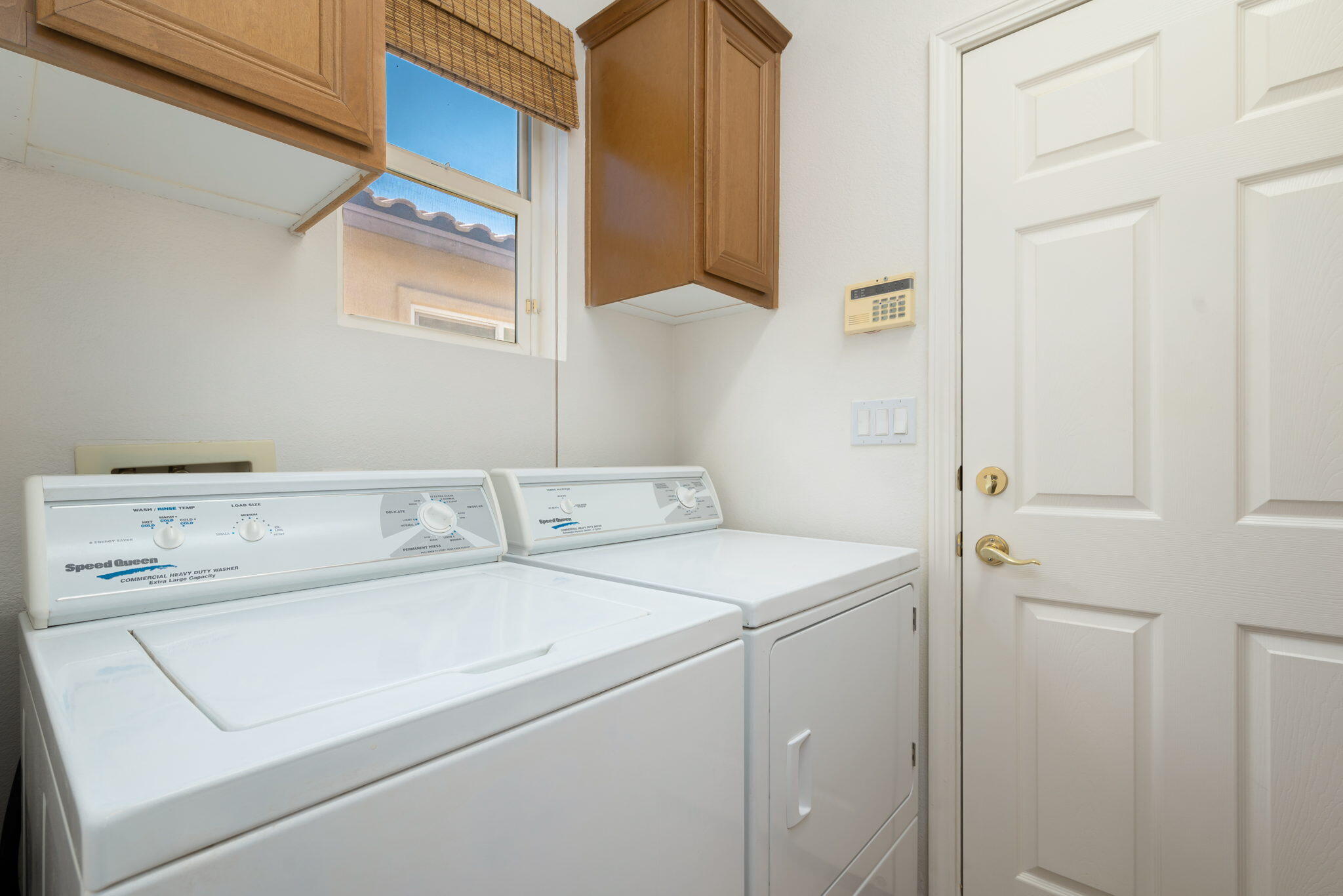 49728 Pacino Street Indio, CA 92201 - Photo 33 of 54 a utility room with dryer and washer