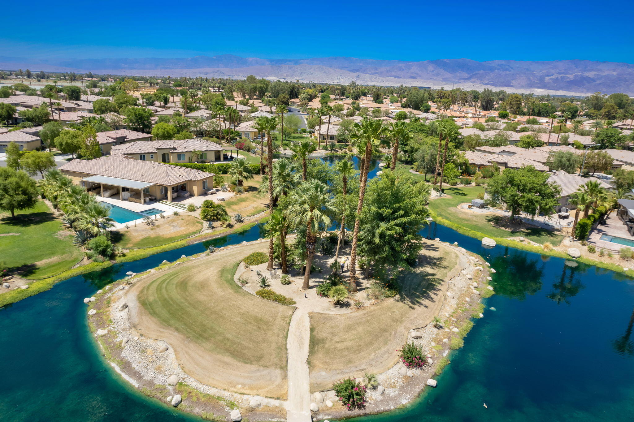 49728 Pacino Street Indio, CA 92201 - Photo 44 of 54 a view of a water with a mountain