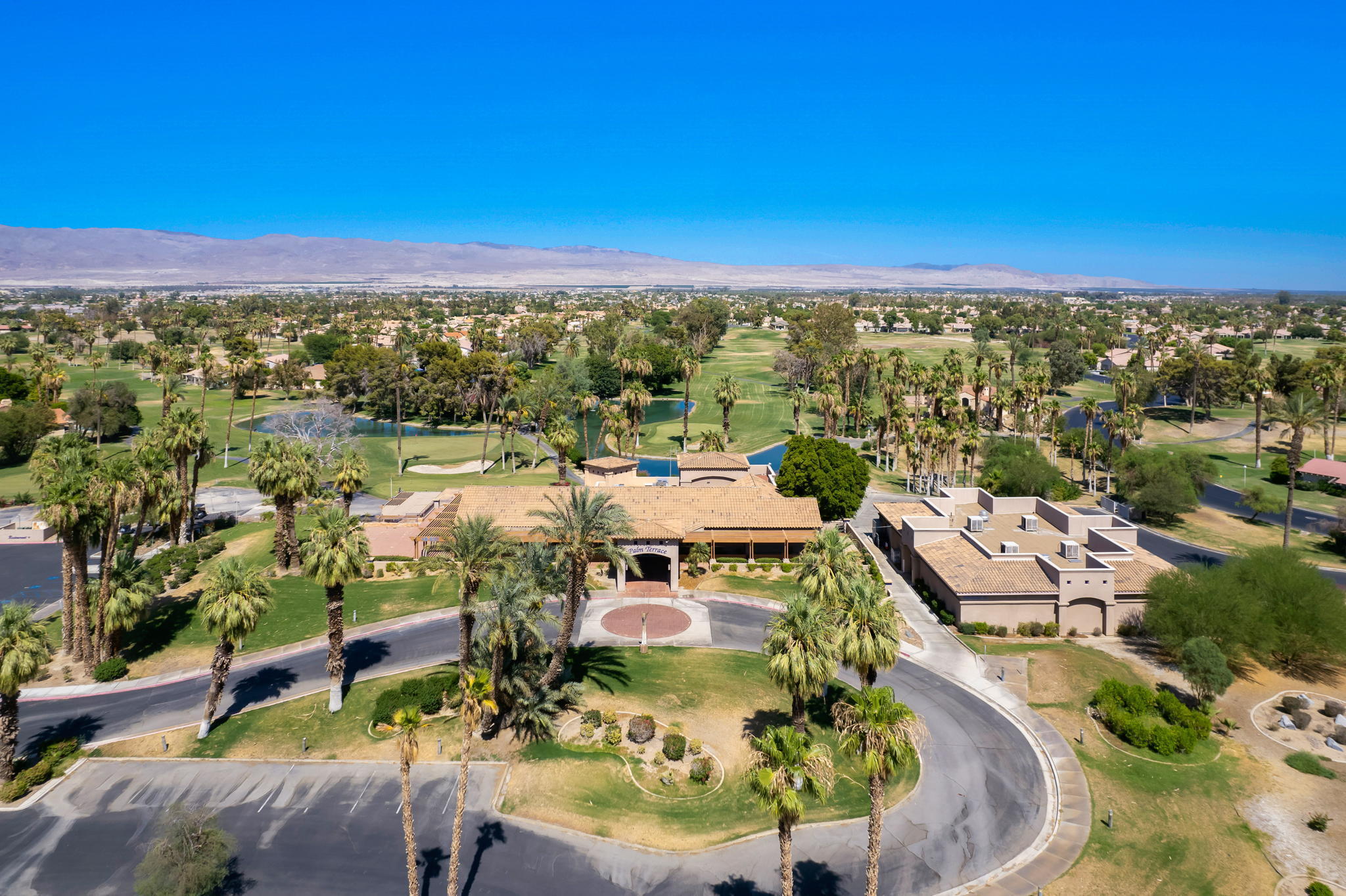 49728 Pacino Street Indio, CA 92201 - Photo 49 of 54 an aerial view of residential houses with outdoor space