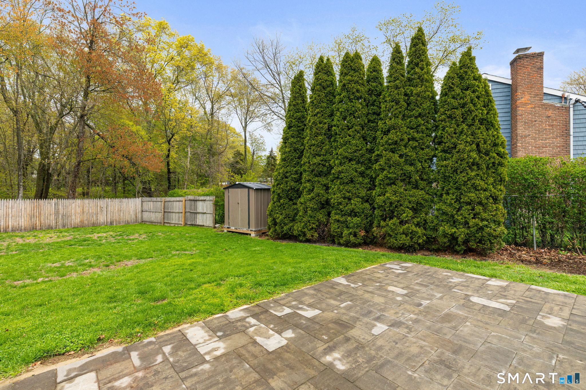 40 Beacon View Drive, Unit 2 Fairfield, CT 06825 - Photo 11 of 18 a view of a back yard