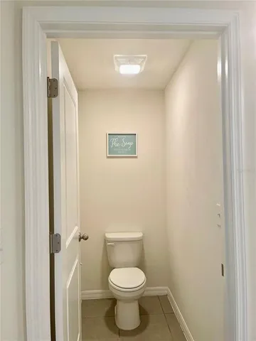 a spacious bathroom with a double vanity sink mirror and bathtub