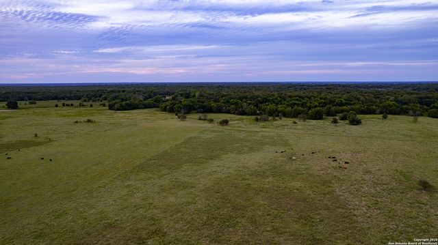 a view of a lake with a city
