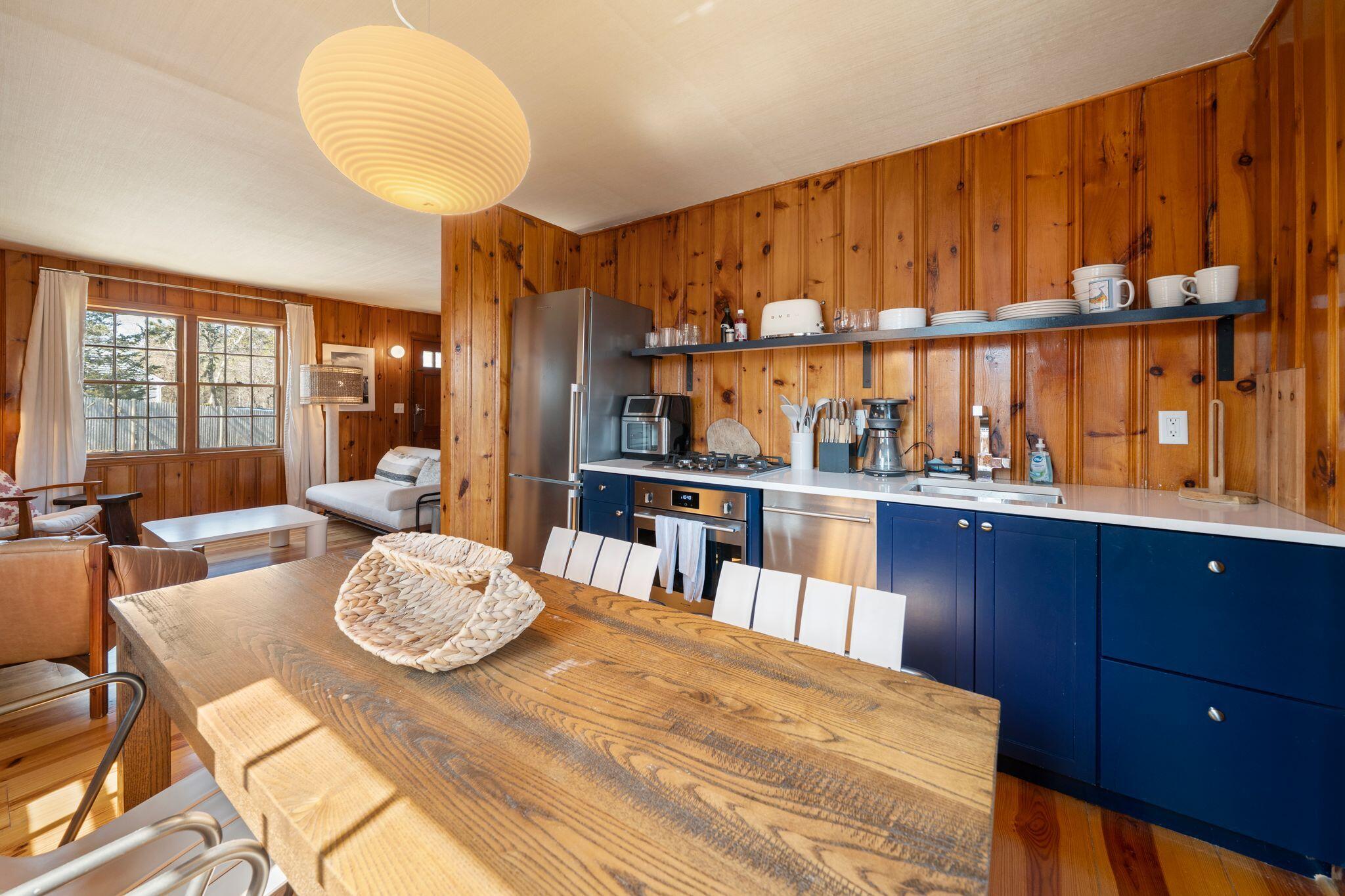 18 Manning Road Dennis Port, MA 02639 - Photo 12 of 34 a view of a dining room with furniture window and wooden floor