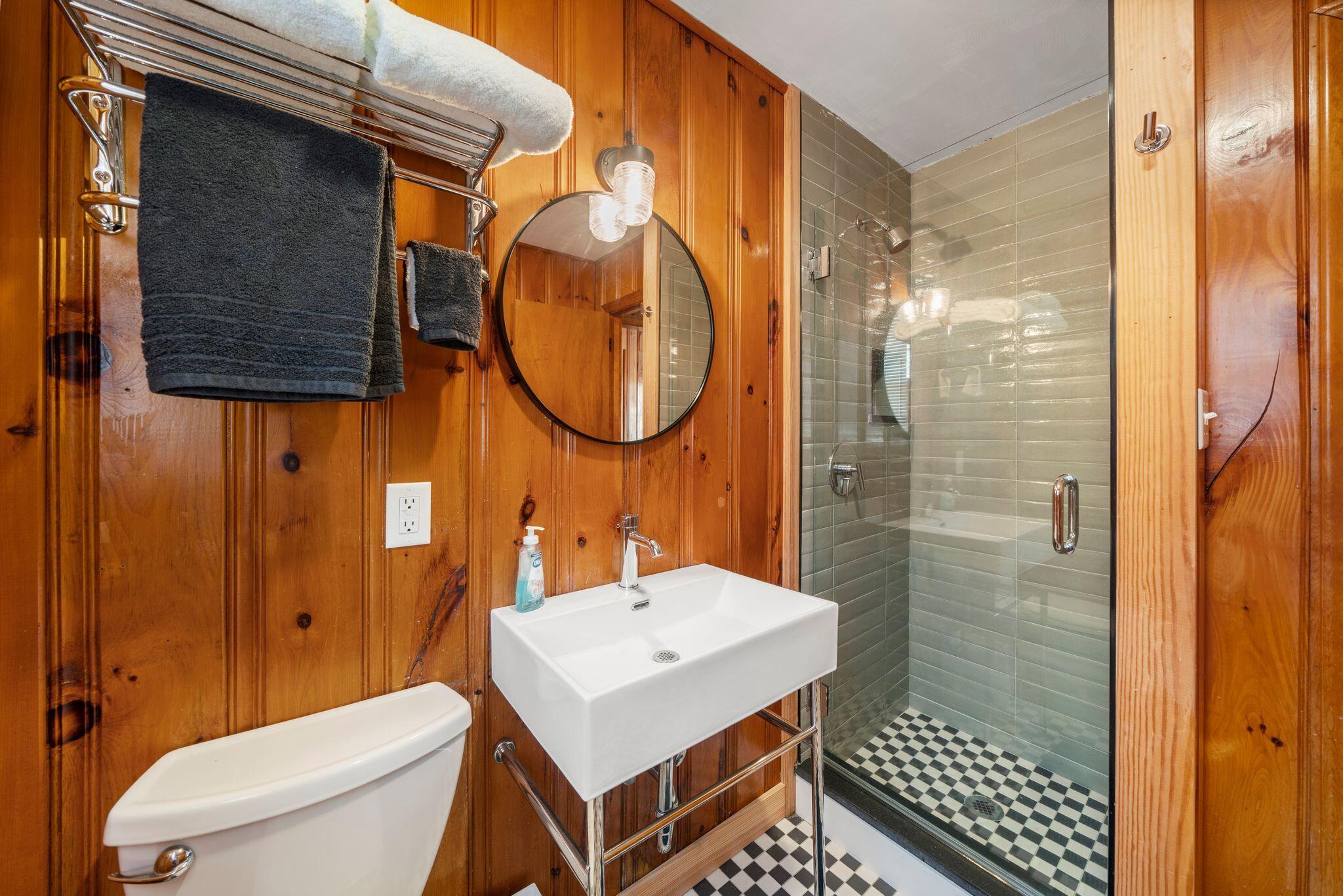 18 Manning Road Dennis Port, MA 02639 - Photo 20 of 34 a bathroom with a sink a toilet and shower